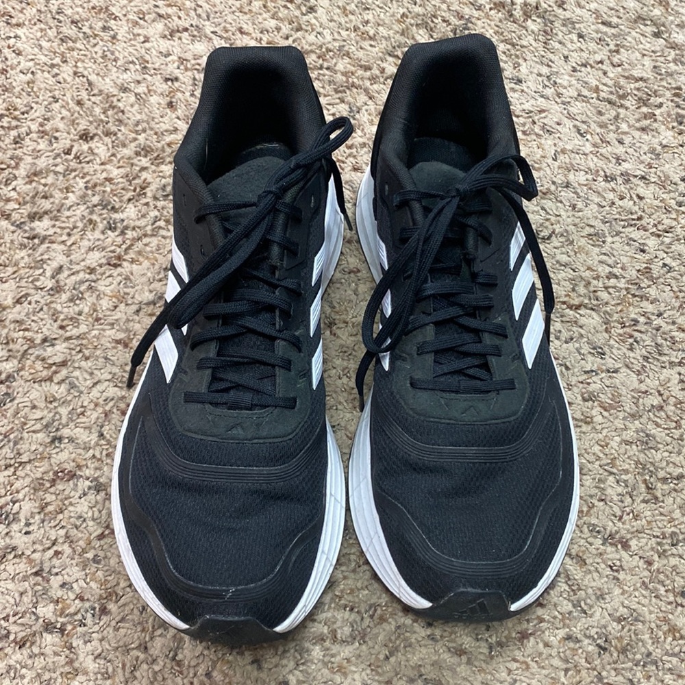 Women’s Adidas sneakers.